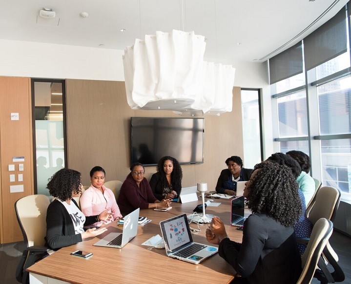 conference table with a group of women